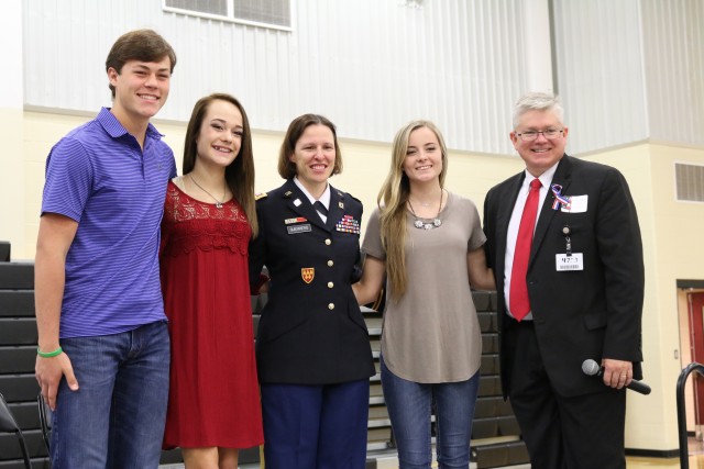 Student who led the Veterans Day Program and Schools Principal