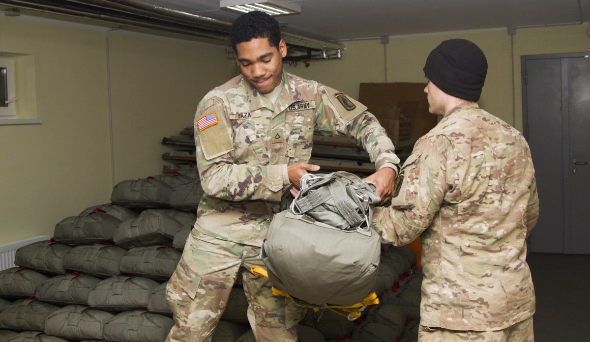Parachute riggers establish readiness one parachute at a time Article