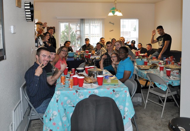 Fort Riley Soldiers and families share Thanksgiving dinner Nov. 24.