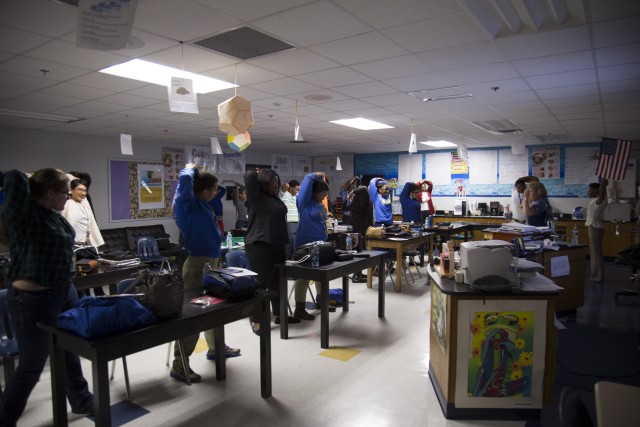 Ambassadors teach human anatomy, high school students show interest
