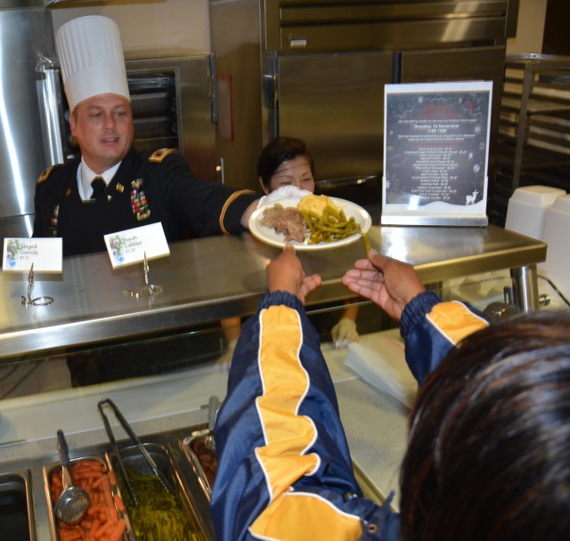 CRDAMC holiday spirit glowing with song, food and cheer