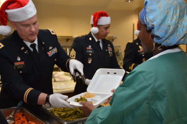 CRDAMC holiday spirit glowing with song, food and cheer