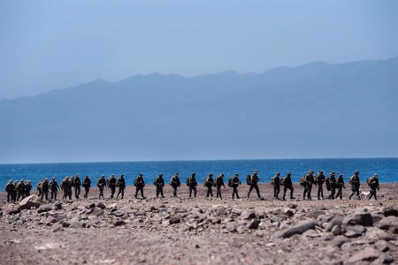 U.S. military personnel assigned to Combined Joint Task Force-Horn of Africa, along with French Foreign Legion soldiers, attend a desert commando course in Arta, Djibouti. Through unified action with U.S. and international partners in East Africa, CJTF-HOA conducts security force assistance, executes military engagement, provides force protection, and provides military support to regional counter-violent extremist organization operations in order to support aligned regional efforts, ensure regional access and freedom of movement, and protect U.S. interests.
