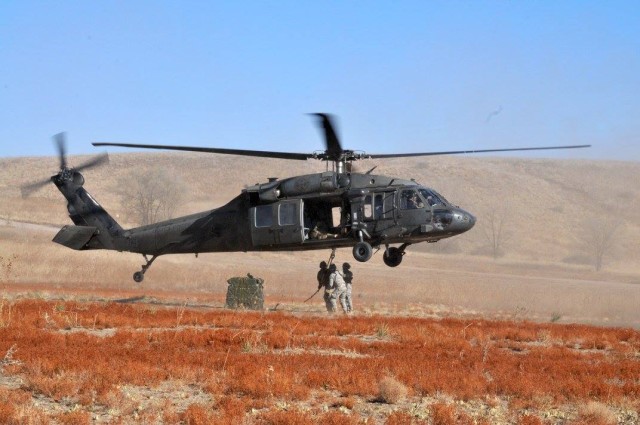 Blackhawk crew slings snow mobiles. | Article | The United States Army