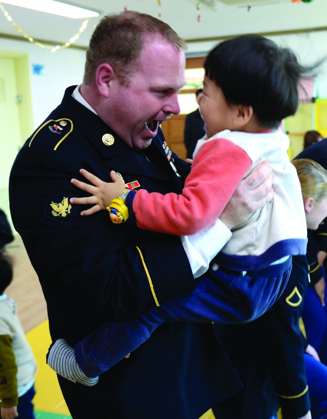 304th ESB Soldiers bring the spirit of Christmas to local orhpans and hospital patients