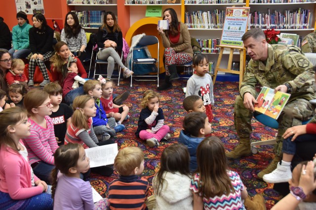 Children enjoy Christmas story hour at Yongsan library