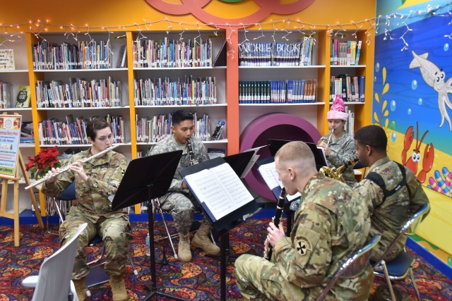 Children enjoy Christmas story hour at Yongsan library