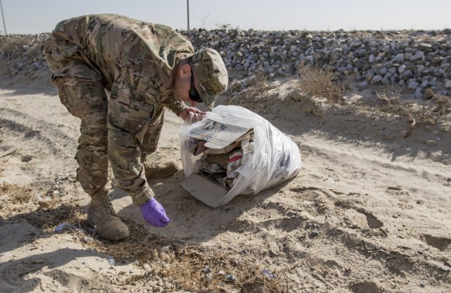 Deployed Soldiers Clean up Camp