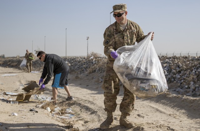 Deployed Soldiers Clean up Camp