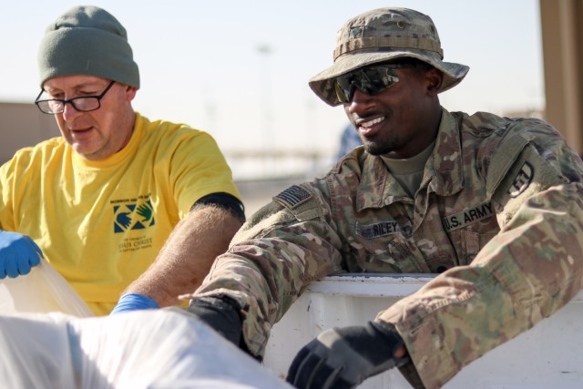 Deployed Soldiers Clean up Camp