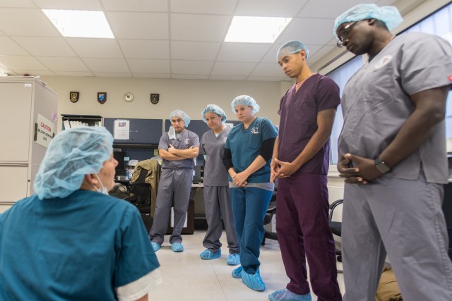Surgical soldiers get their paws dirty