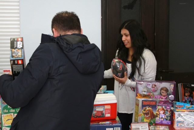 Devil Dogs with halos collect toys for local children