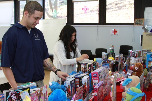 Devil Dogs with halos collect toys for local children