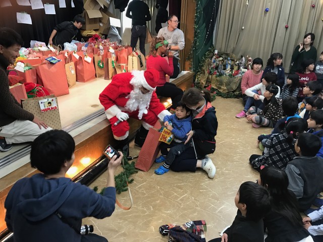 "Wolfhound Santa" delivers gifts to Children of Holy Family Home in Osaka, Japan