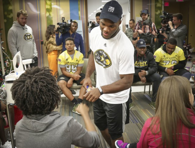 All-American Athletes and Soldiers join forces to bring smiles to kids