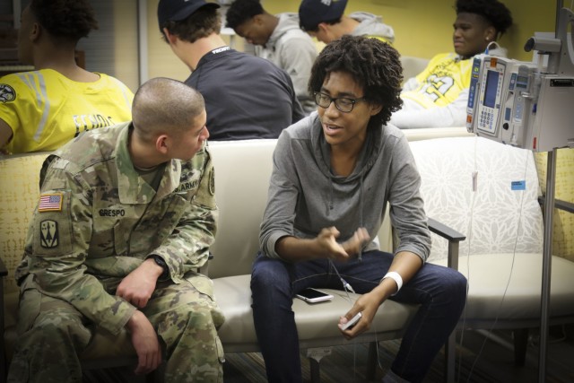 All-American Athletes and Soldiers join forces to bring smiles to kids
