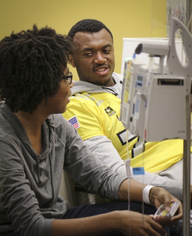All-American Athletes and Soldiers join forces to bring smiles to kids
