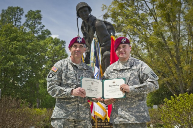 Maj. Gen. Colt re-enlists Staff Sgt. Chavez