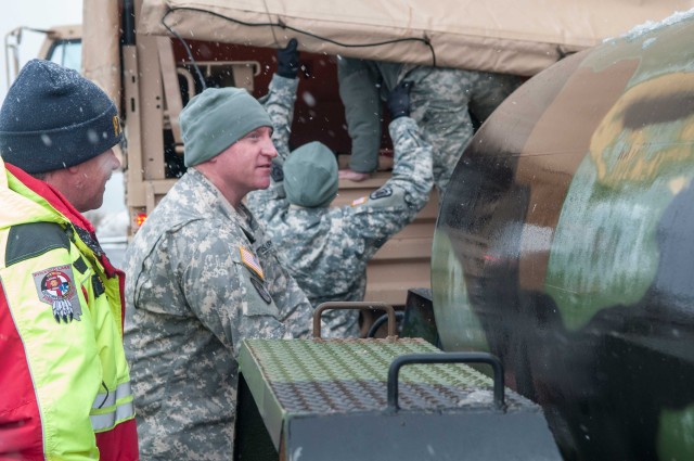 Snow, ice and flooding keep troops busy in Kansas, Missouri, Nevada and Oklahoma