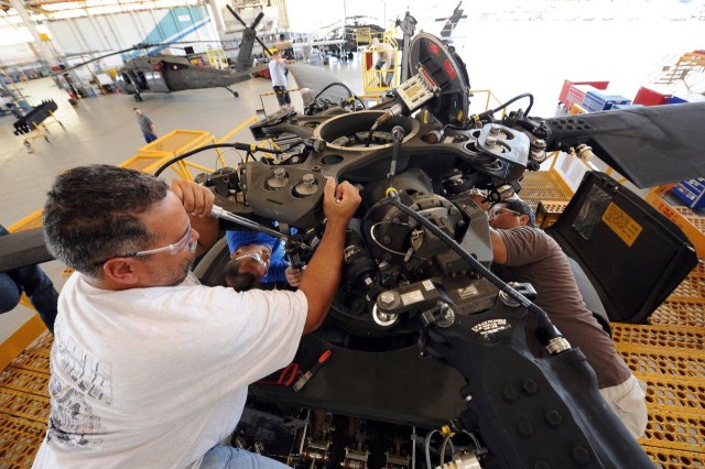 CCAD engineers work on aircraft parts.