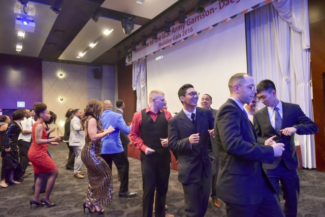 People dance together during the Garrison Gala.