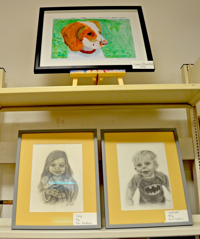 Local artists display their work in Wiesbaden Library exhibit Article