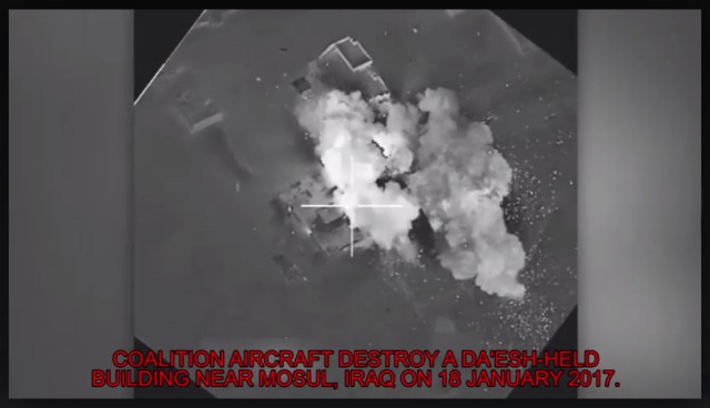 Coalition aircraft destroy a Da'esh-held building