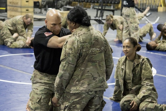 Soldiers at Camp Arifjan train in hand-to-hand combat