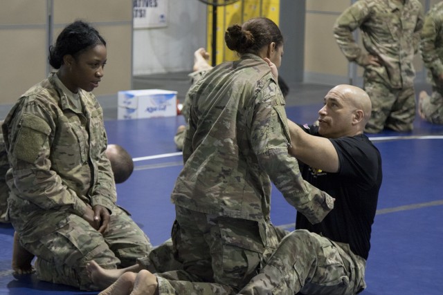 Soldiers at Camp Arifjan train in hand-to-hand combat