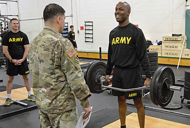 Command Sgt. Maj. Demetrius Brown performs a deadlift