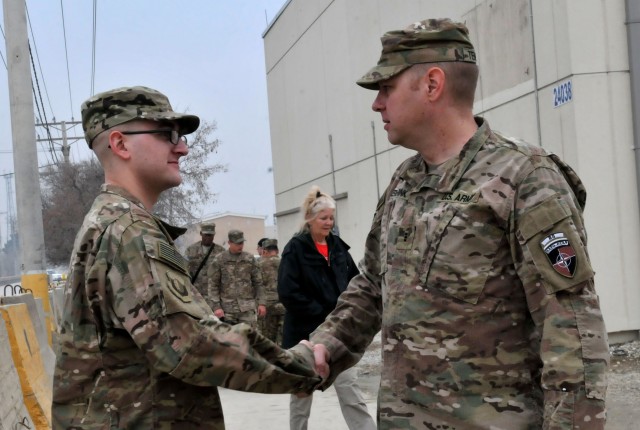 Chief Warrant Officer TenBrink and his son, Senior Airman Benjamin D. TenBrink.