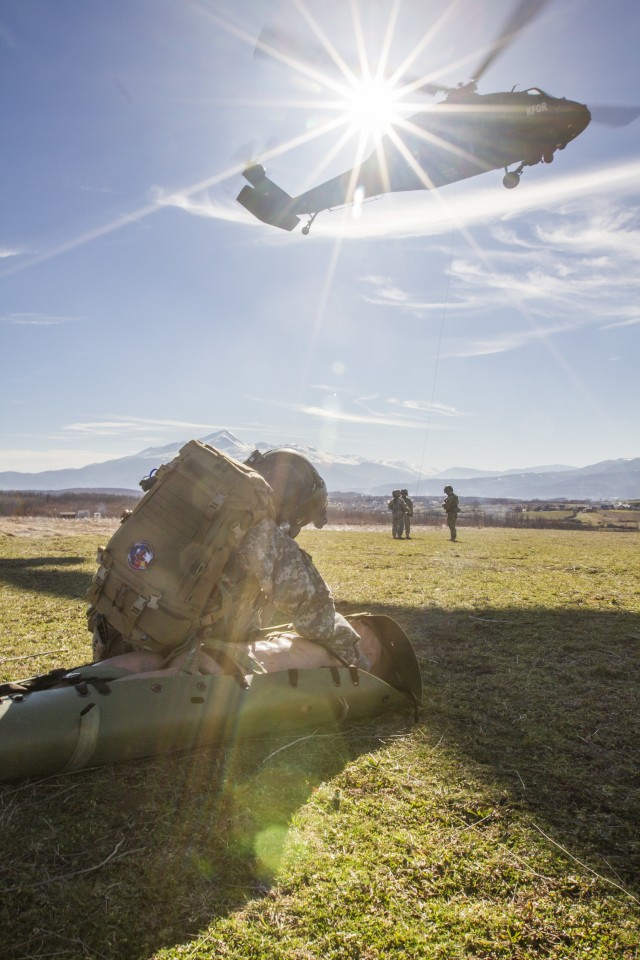 Flight Medic Shields Patient During Training