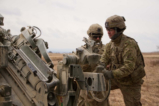 2nd Cav. Regt. artillery gun crews mass fire with NATO Allies