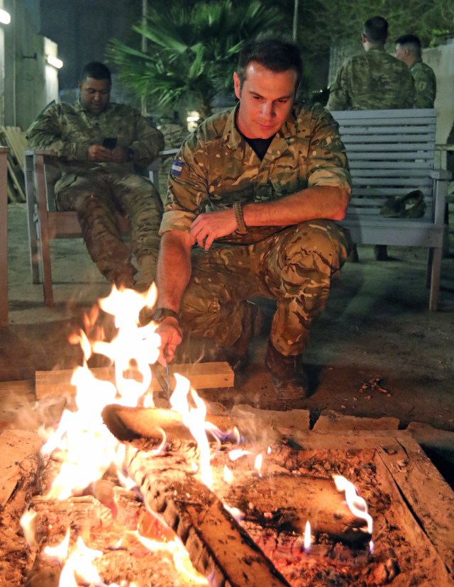 Soldiers deployed to Iraq enjoy a fun night of s'mores