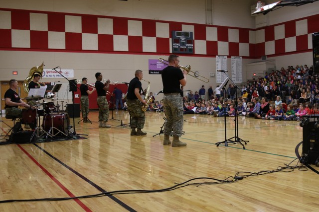 'Big Red One' Brass Band perform during Music In Our Schools month