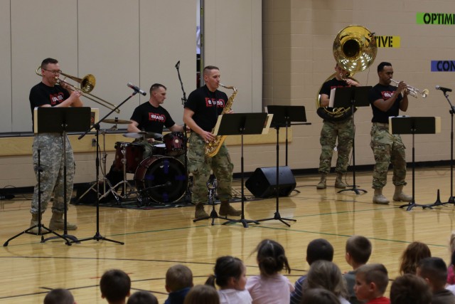 'Big Red One' Brass Band perform during Music In Our Schools month