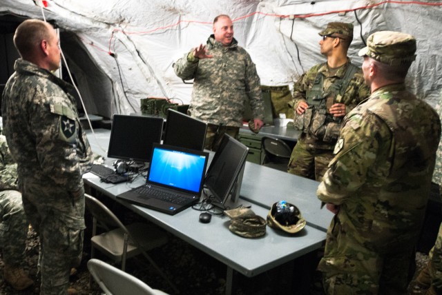 Leaders from the 301st Maneuver Enhancement Brigade discuss future movement plans