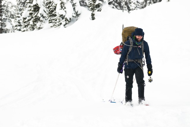 Alpine guide Derrick Pierson uses snowshoes to walk to his destination during the practical portion of the JBLM Alpine Club basic alpine course, Mount Rainier National Park, Washington