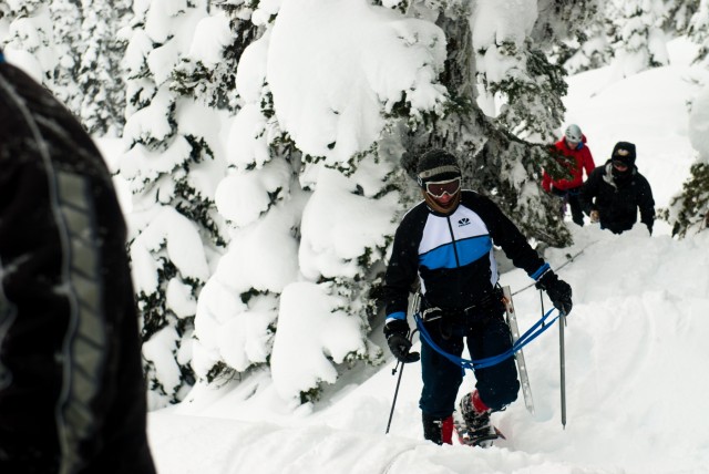 Mark Deschene, front, uses glacier travel techniques as part of a mountaineering rope team, at the JBLM Alpine Club basic alpine course, Mount Rainier National Park, Washington