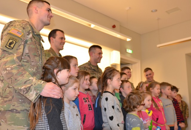 US Soldiers celebrate Easter early with Lithuanian children