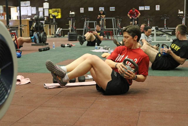 Lt. Col. Sara Dudley leads a fitness class for other servicemembers in Baghdad