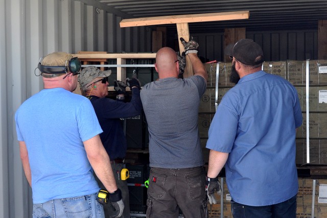 TEAD employees provide blocking and bracing for munitions