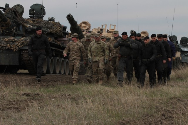 US, Romanians train in wind and rain