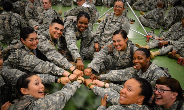 Soldiers proudly show off their Strong B.A.N.D.S. wristbands