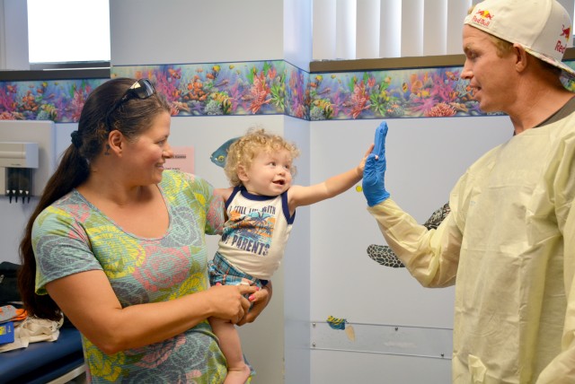 Surfers bring aloha to Tripler's Cystic Fibrosis Center