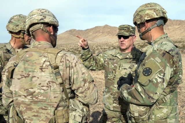 U.S. Army Chief of Staff, Gen. Mark A. Milley, talks with Observer Controllers