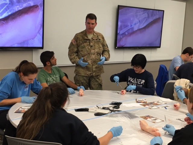Munson Army Health Center physicians teach the art of suturing