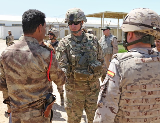Maj. Gen. Martin talks with Iraqi soldiers about their training