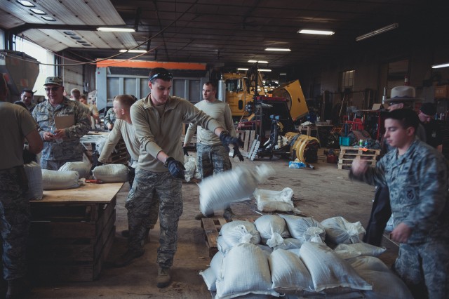 New York National Guard members sandbagging areas around Lake Ontario