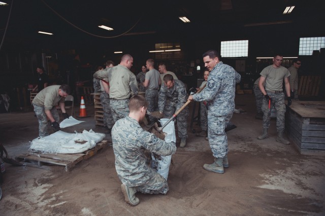 New York National Guard members sandbagging areas around Lake Ontario